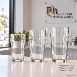Vasos de cerveza tipo pinta británica de 28,4, 47 y 56,8 cl para personalizar, sobre barra de hostelería